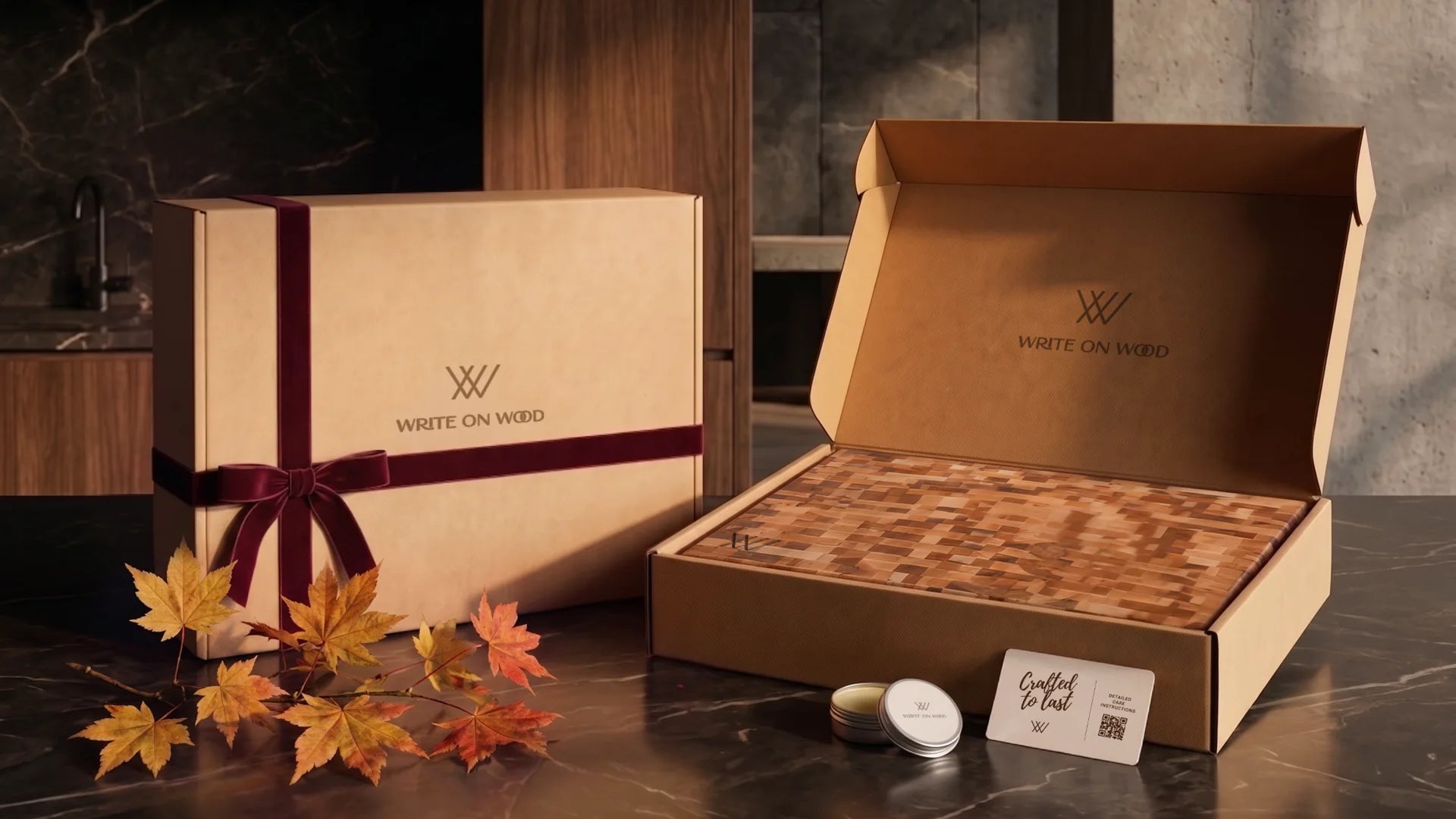 Write On Wood gift presentation with branded kraft boxes, burgundy ribbon, maple leaves, a Luxury end-grain board, beeswax, and a care card