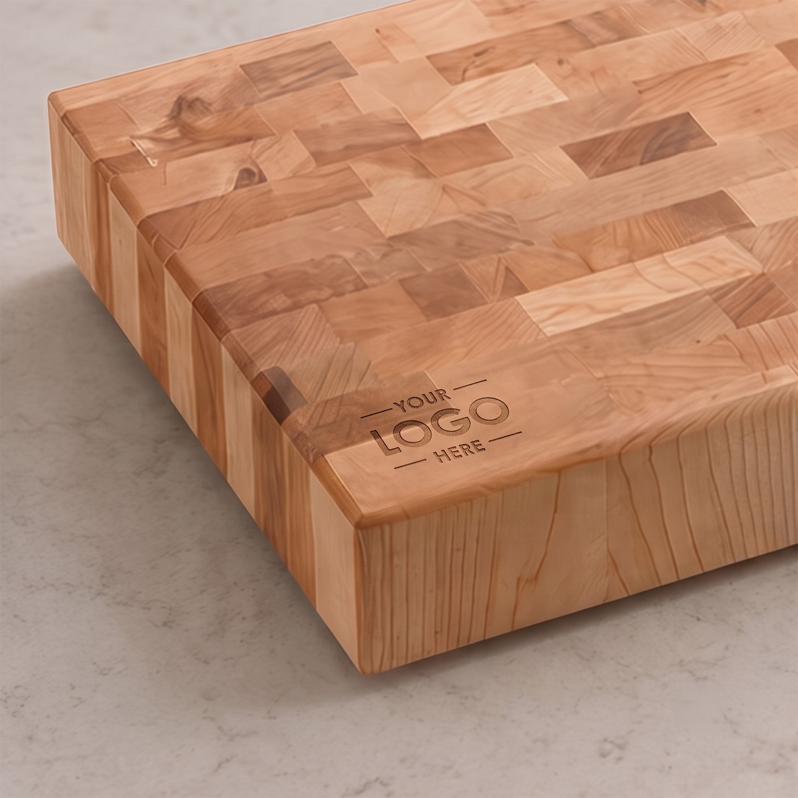 Top-face corporate logo engraving example on a round Maple or Luxury board